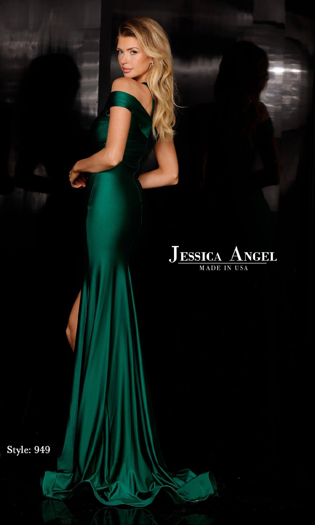 A woman models the Jessica Angel 949 Cut-Out Long Prom Dress in emerald green with a one-shoulder design, mermaid skirt, and thigh-high slit. She poses before a black background. Text: